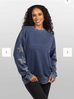 Chicka-d women’s Crewneck Sweater in Heather Blue with Sleeve Star Detail